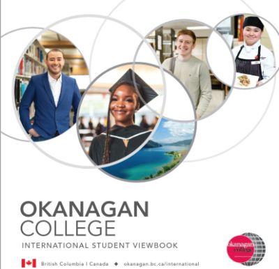 International student smiling at convocation wearing regalia and parchment in hand