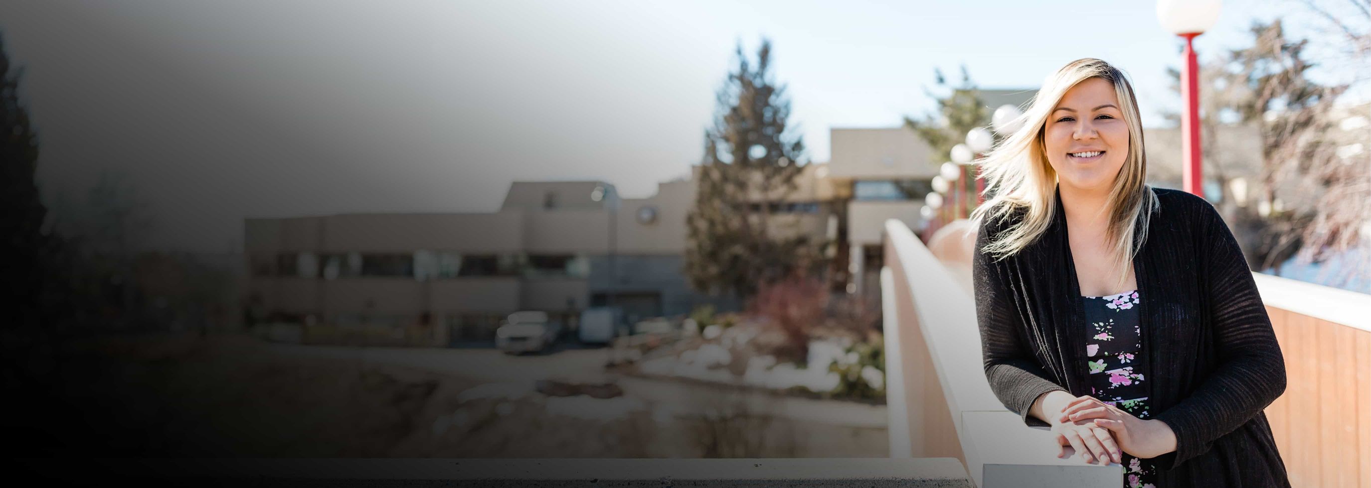 Vernon student leans on pedestrian crossing