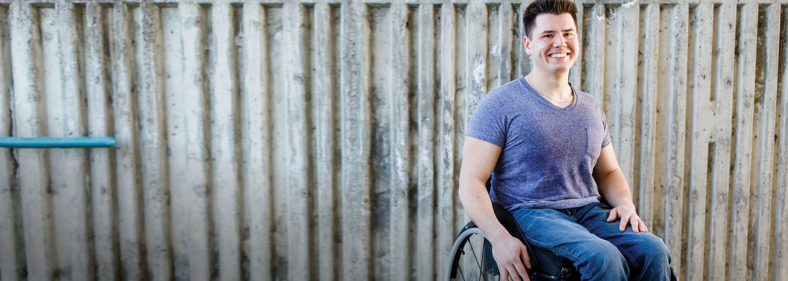 Student in a wheelchair outside at the Salmon Arm campus