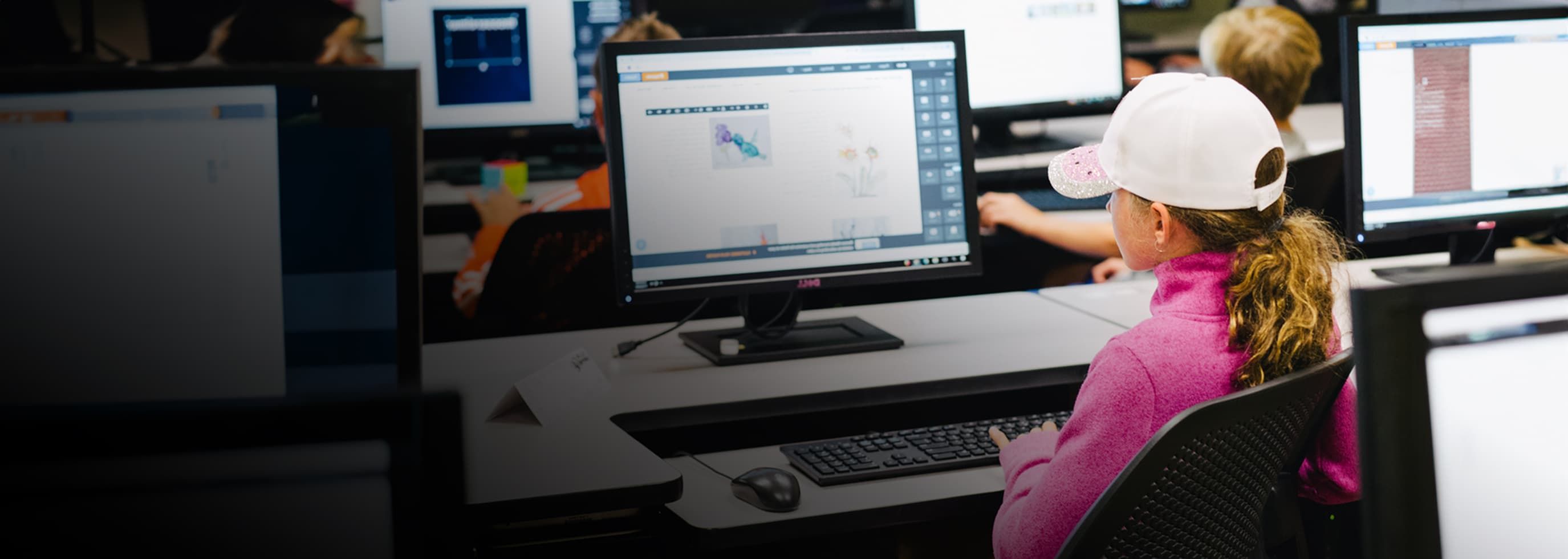 Camp OC student practicing her computer skills