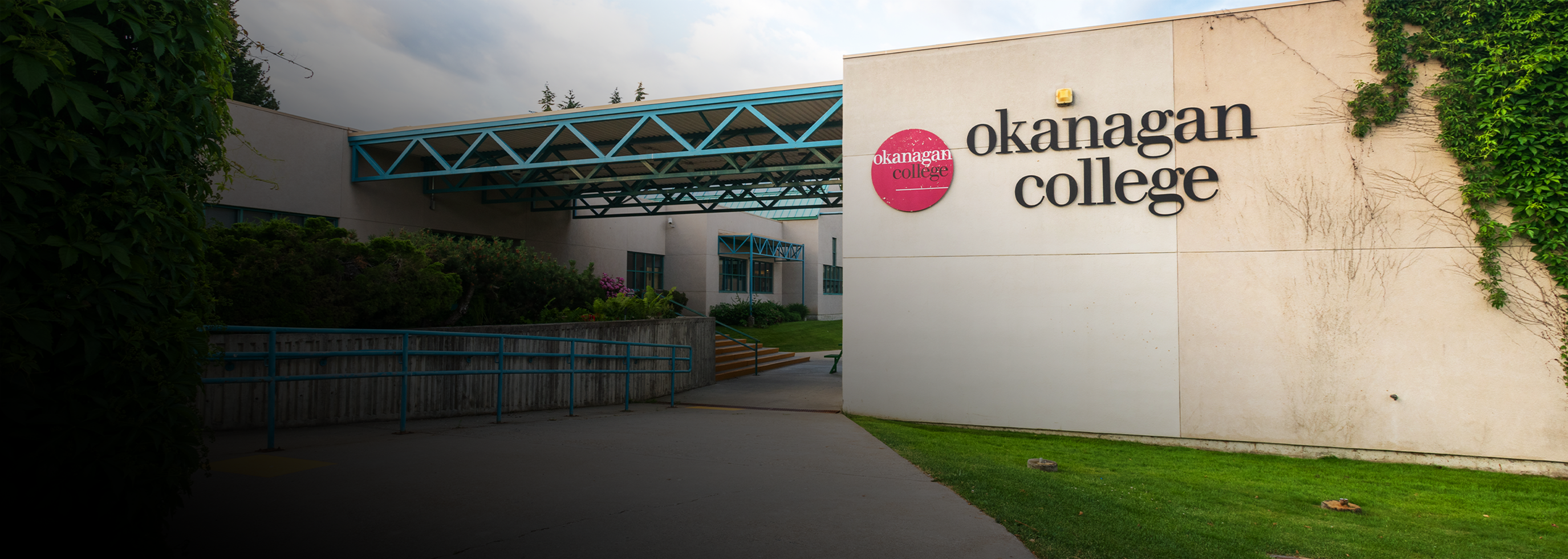 Salmon Arm campus entrance, buildings with foliage