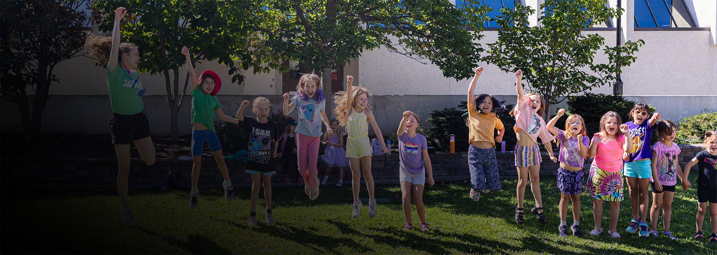 children jumping in a line