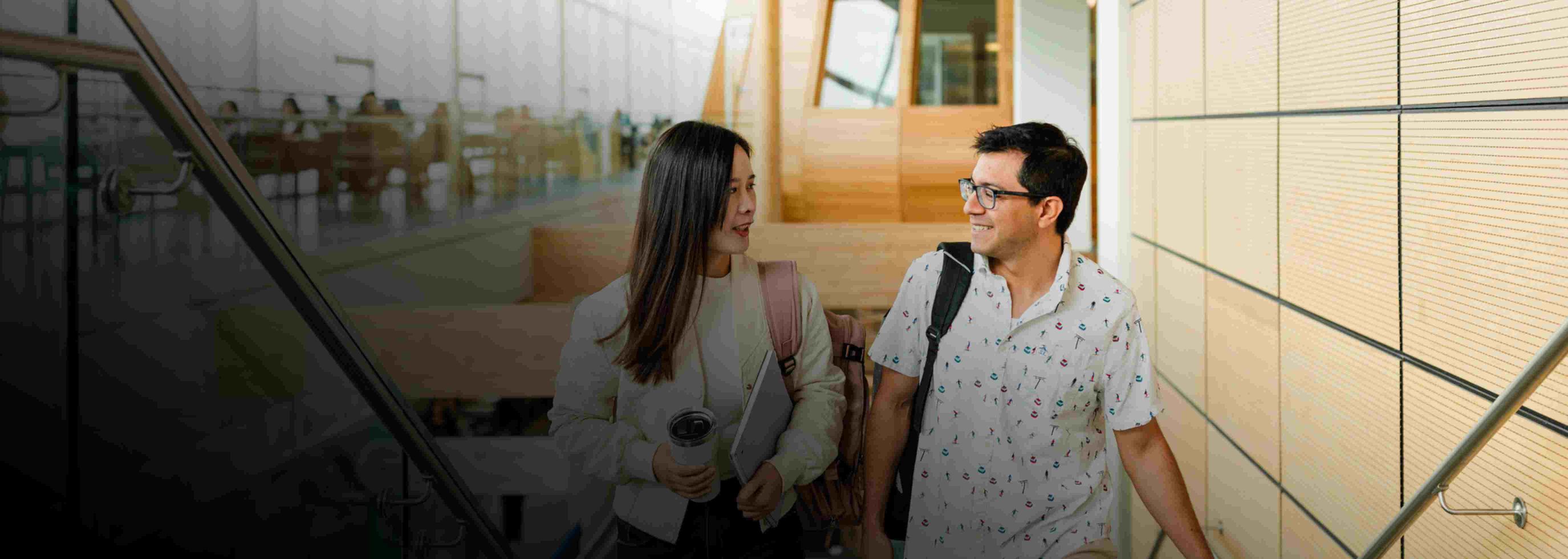 Two people walking and talking