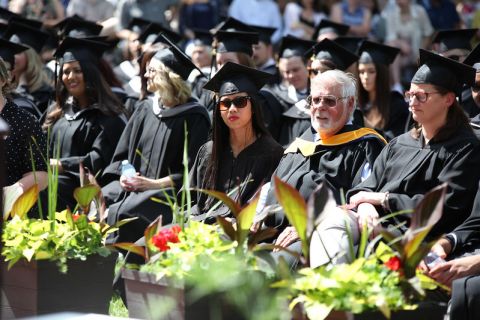 Students sitting waiting for graduation