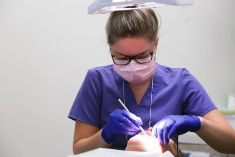 Certified Dental Assistant student practicing her skills