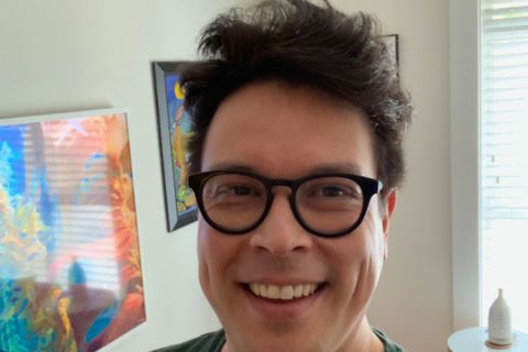 Westbank First Nation Chief Christopher Derickson posing for haircuts for health campaign