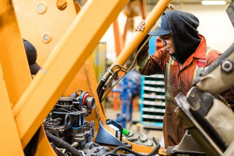 Truck and Transport Mechanic apprentices work in the shop