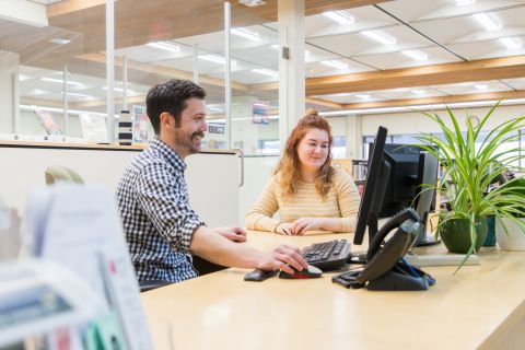 A librarian and student working together on a research question