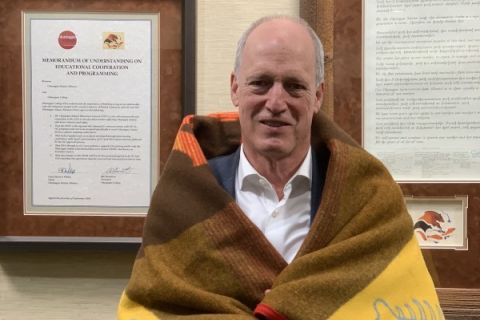 Jim Hamilton wrapped in a blanket from the Westbank First Nation
