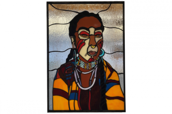 A stained glass portrait of an Indigenous person in traditional dress.