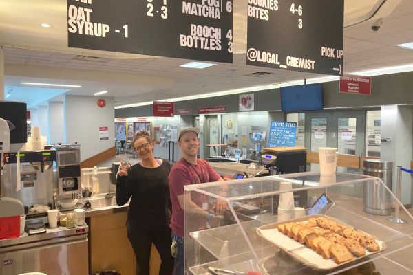 Local Chemist staffers take a break behind the coffee bar to wave hello