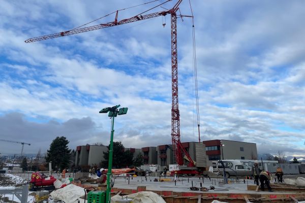 Crane at construction site for new residence building at the Kelowna campus