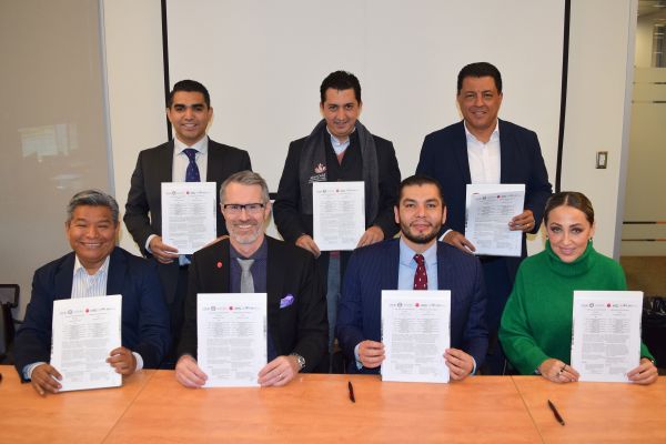A photo of the dignitaries showing their signed MOU's.