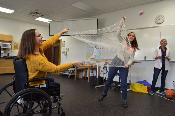 A therapist assistant working with a client.