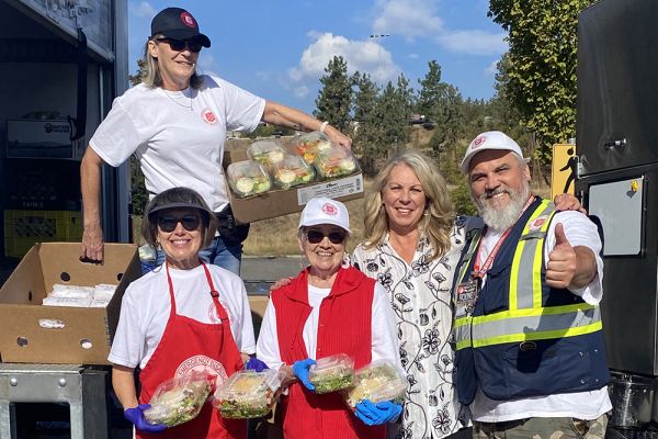 Members of the OC community drop off food for wildfire workers.