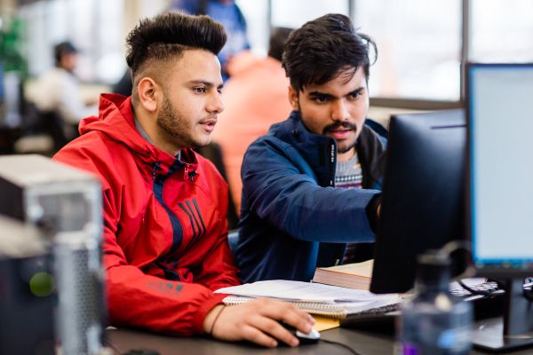 two students at computer