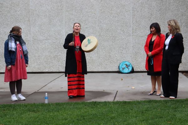 Rhea Dupuis, OC’s Director of Indigenous Relations and Reconciliation leads a ceremonial drum circle in honour of MMIWG2SP 