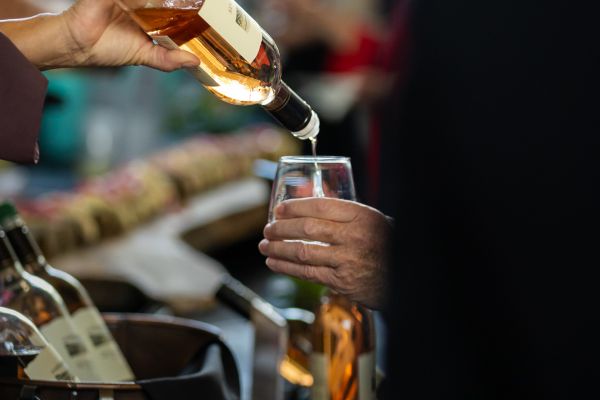 Wine bottle being poured 
