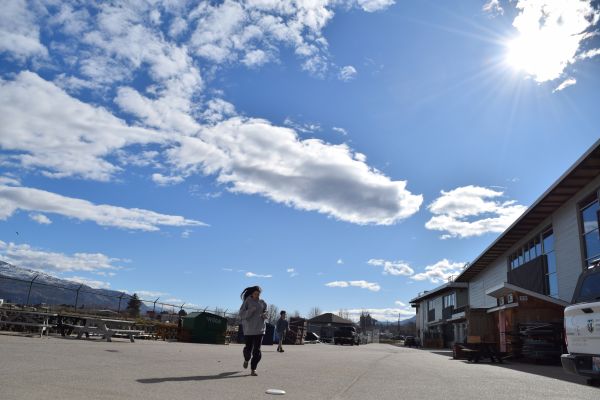 Student running towards camera 