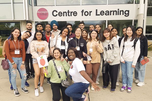 Student Volunteers in front of the Centre for Learning Building