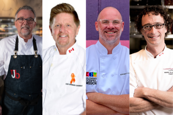 Four chefs standing smiling