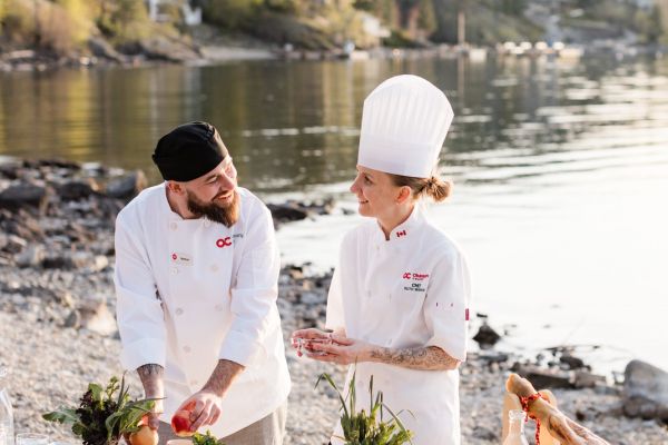 Nathan presenting his culinary arts by a lake