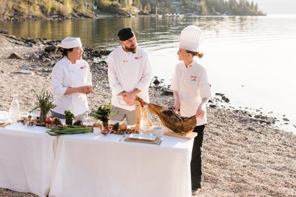 Culinary students learning to cook by the lake