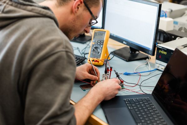 Student doing measurements