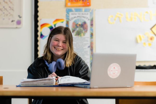 Student smiling in class