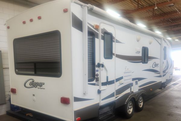 Outside view of the 2012 Keystone Cougar 25RLS Travel Trailer