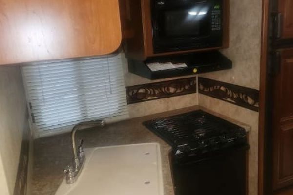 Inside view of the 2012 Keystone Cougar 25RLS Travel Trailer
