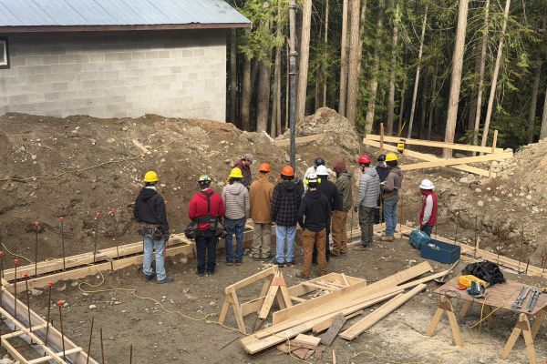 OC Carpentry Foundation students framing at Gardom Lake Kids Camp and Retreat Centre 