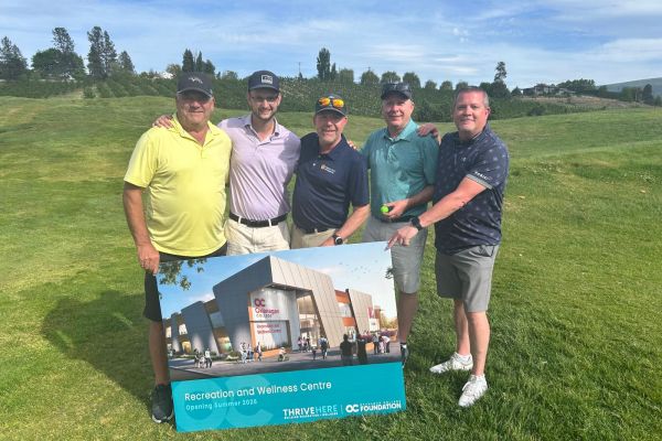From left to right: Jim Kentel, Braden McKay, Robin Smith, President of the Rotary Club of Kelowna, Geoff McIntyre and Darcy Haw.