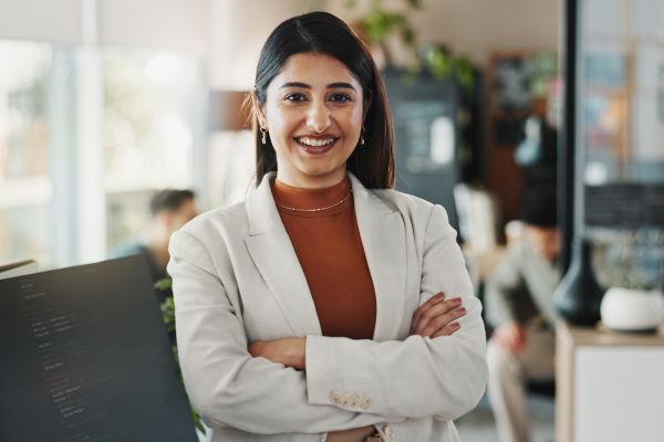 Professional standing in an office.