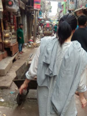 Dr. Mary Hanlon walking through the streets in Dhaka Bangladesh