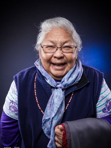 Grace Greyeyes looks at the camera, smiling