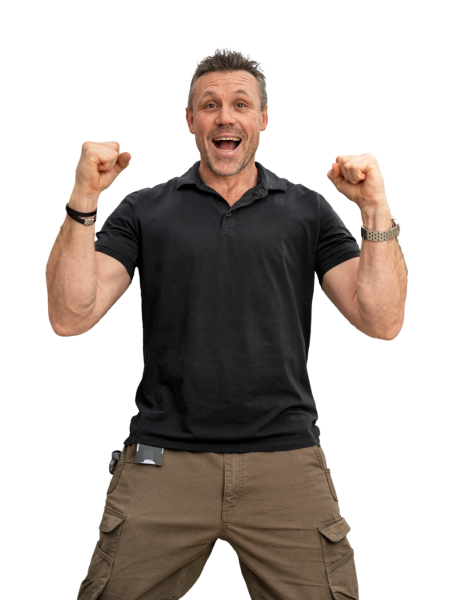 An OC employee raising his arms in the air