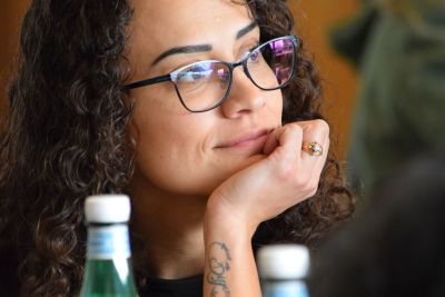 girl smiling in a distance 