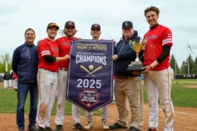 4 seniors receiving championship banner and trophy,  from Left to right, Ethan Skiffington, Teagan Ribbink, Cory Lawson, Adrian Orioli