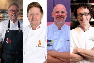 Four chefs standing smiling