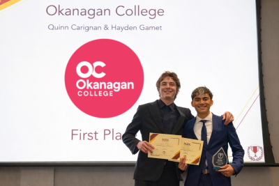 o	OC students Quinn Carignan (left) and Hayden Gamet (right), winners of the finance competition.