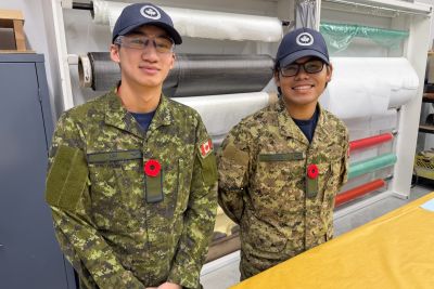 Royal Canadian Air Force Aviator Bosco Lai (left) and Aviator Prim Masa