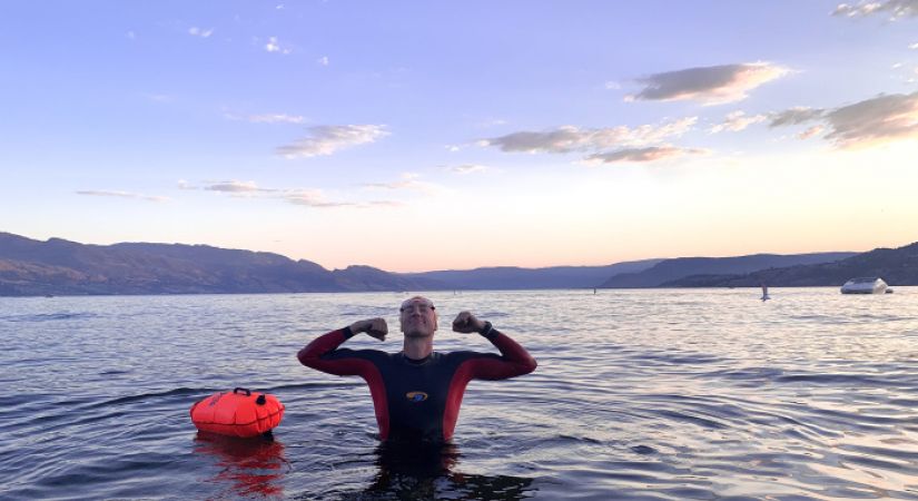 Nick Pelletier swimming in the lake