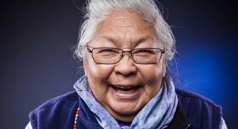 Grace Greyeyes looks at the camera, smiling