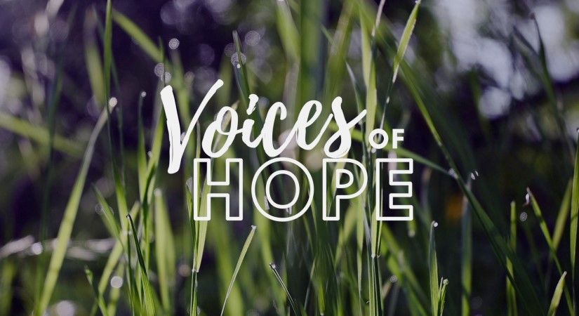 Voices of Hope text overlaid on a background with grass