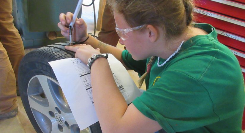 Student in the automotive shop