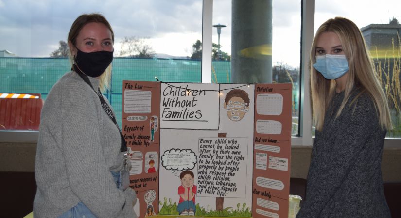 Two Early Childhood Education students showcase their presentation during National Child Day