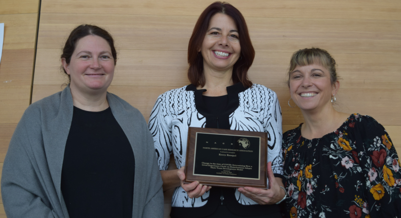 Three Okanagan School of Business professors pose for a photo after winning the bronze medal at the North American Case Conference