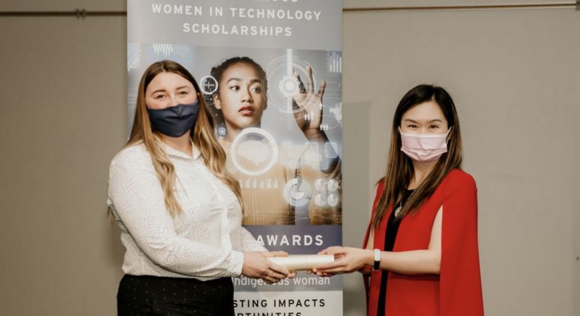 OC student receives an award from MLA Anne Kang. 