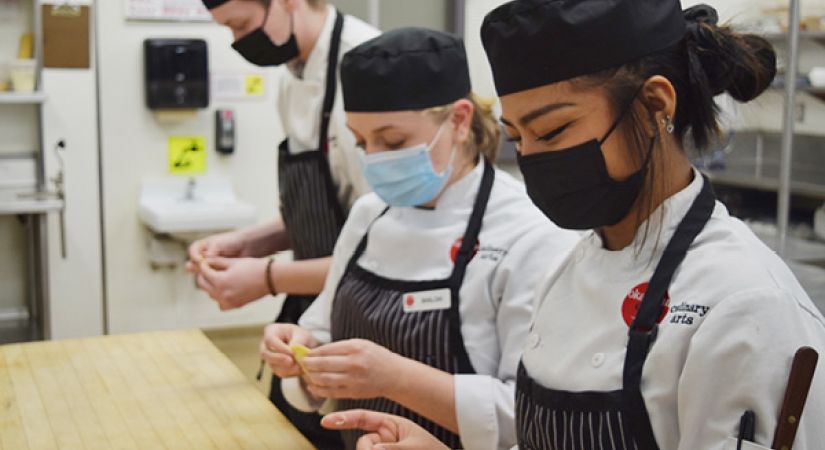 Culinary Arts students Chase Holman, Shiloh Marriot and Claire Lind